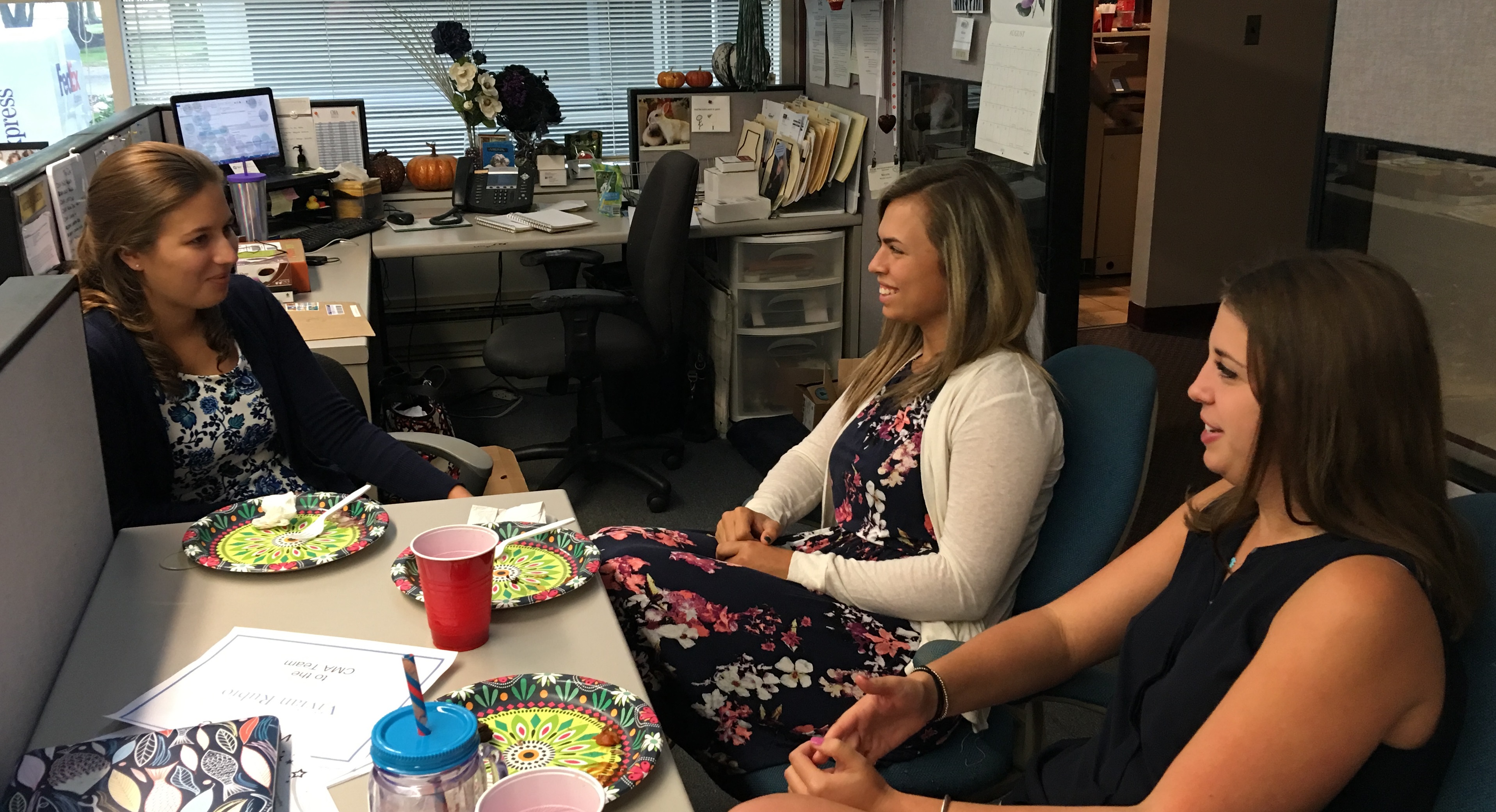 CMA Interns Casey Parrett, Samantha Collar and Jordannah Schreiber share a moment during a CMA luncheon.